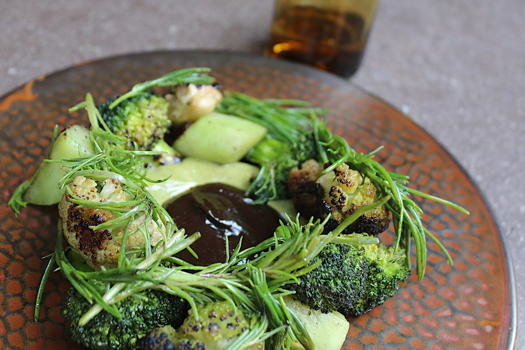 Broccoli and Cauliflower with black bean paste on a plate