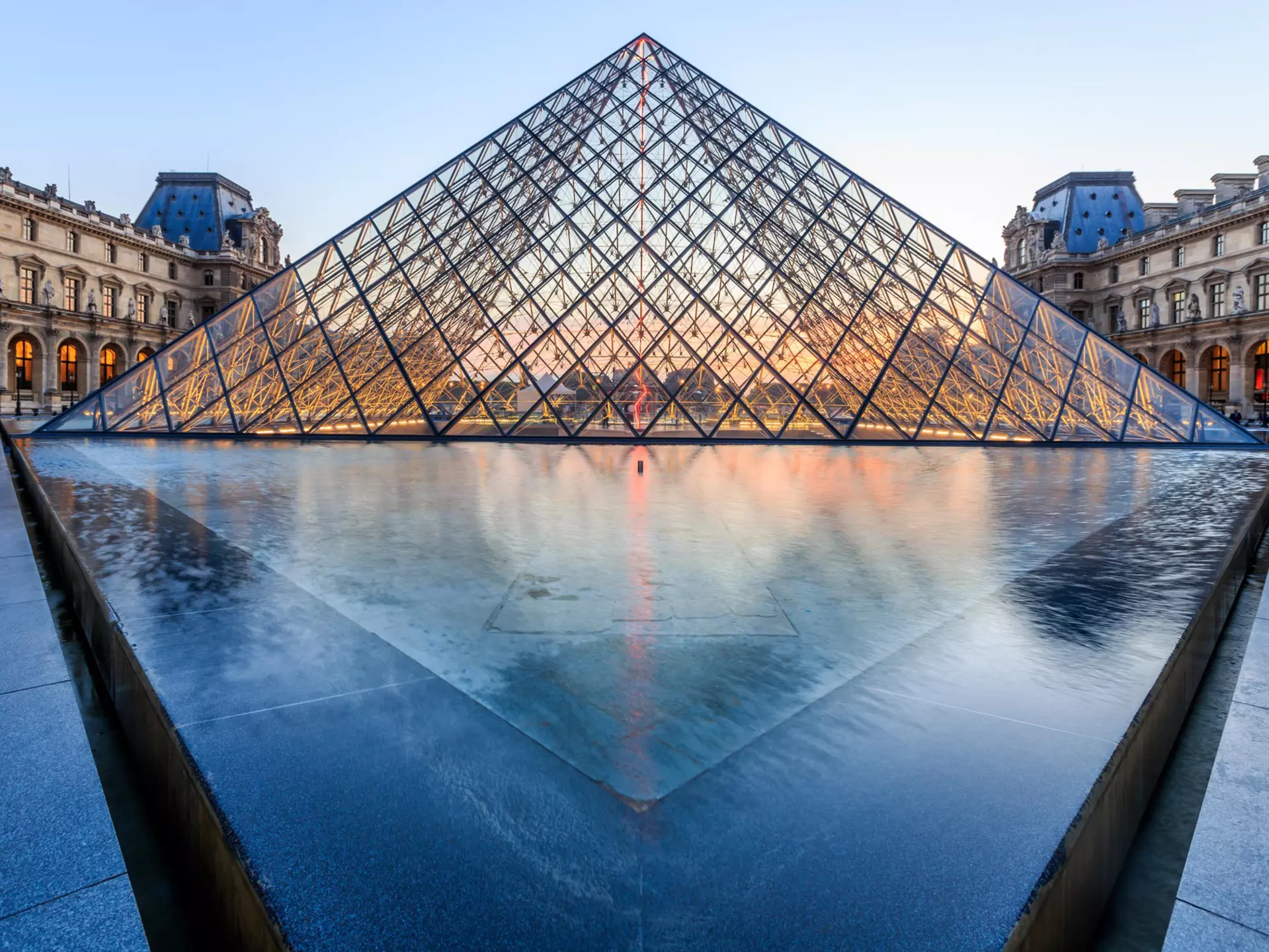 PARIS, FRANCE - JULY 19: The Louvre Pyramid at dusk during the Michelangelo Pistoletto Exhibition on July 19, 2014 in Paris. The Pyramid is the main entrance to the Louvre Museum.
architecture, art, beautiful, building, city, dusk, entrance, europe, european, evening, exhibition, famous, france, landmark, landscape, light, louvre, museum, night, palace, paris, pyramid, reflection, tourism, tourist, travel, twilight