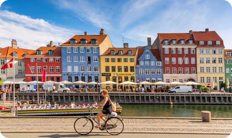 Cycling by a canal in Copenhagen