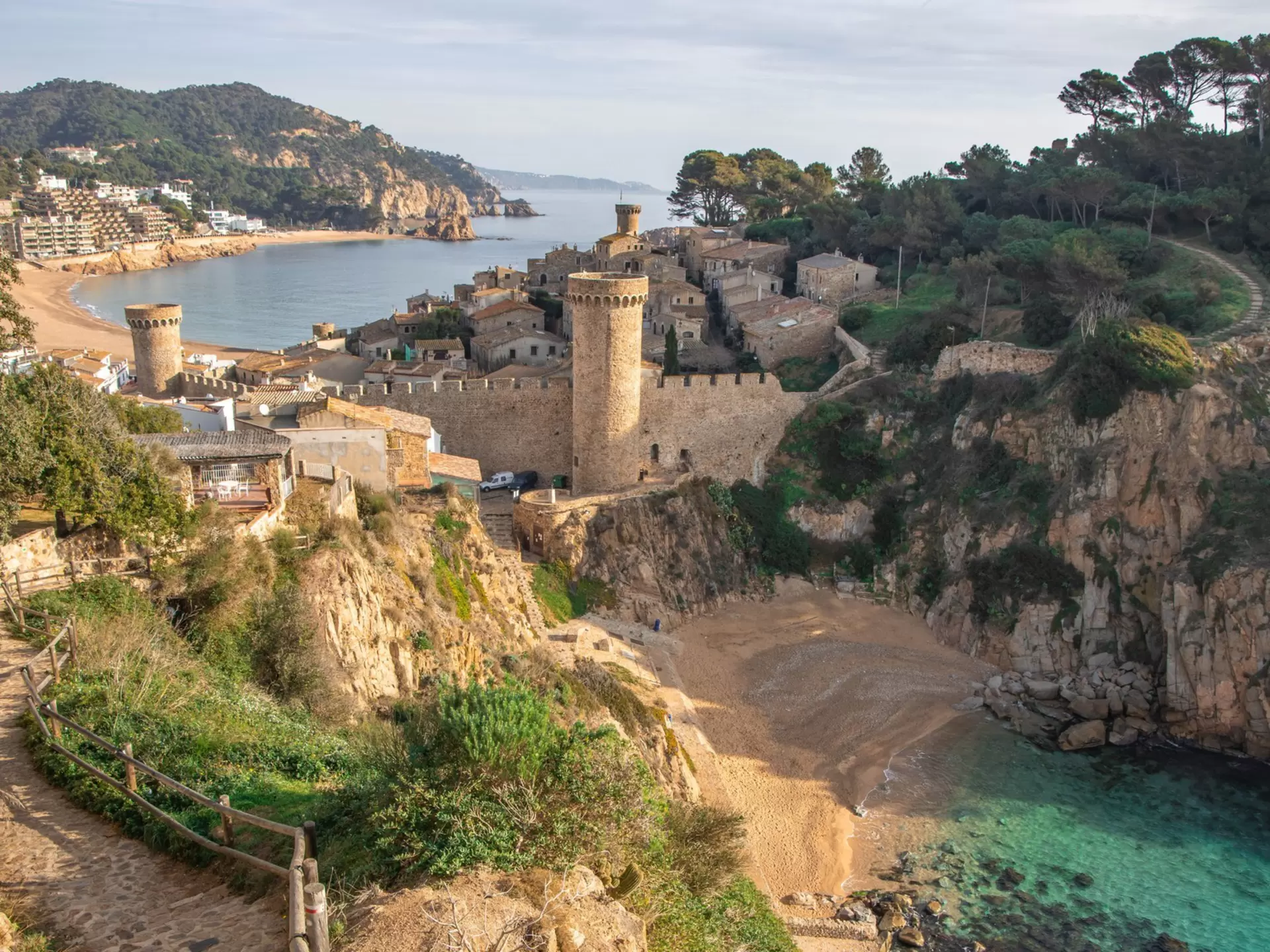 1299287031
Beautiful fortification town in the Costa Brava coast of Spain with the colors of the sea. El precioso pueblo amurallado de Tossa de Mar en la Costa Brava. - stock photo
Tossa de Mar. Costa Brava. Spain.