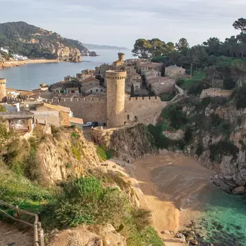 1299287031
Beautiful fortification town in the Costa Brava coast of Spain with the colors of the sea. El precioso pueblo amurallado de Tossa de Mar en la Costa Brava. - stock photo
Tossa de Mar. Costa Brava. Spain.