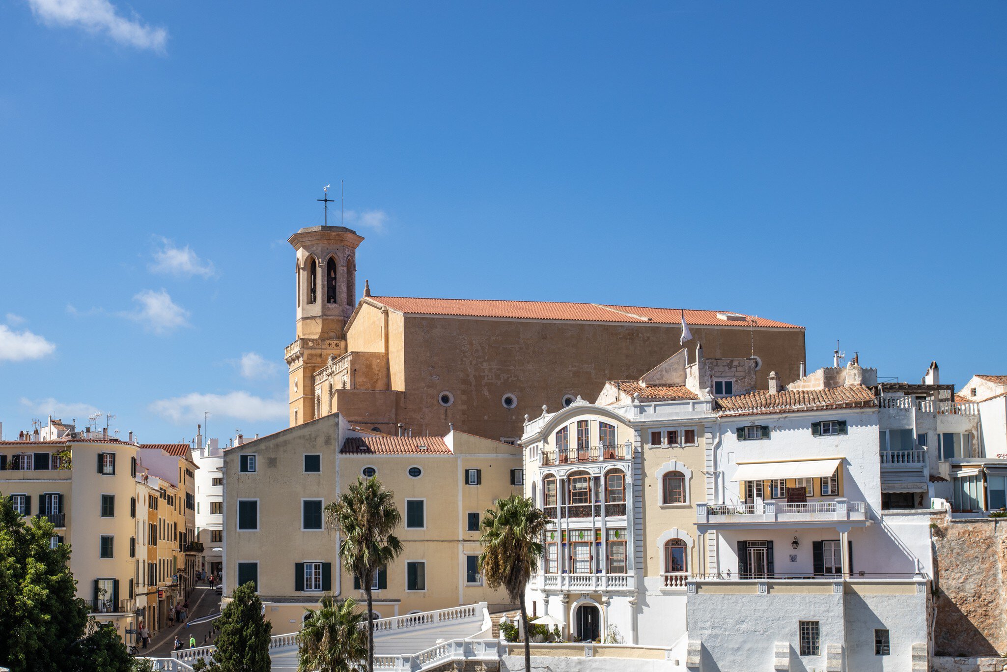 View of the Església de Santa Maria, visible over the town of Maó on the island of Menorca in Spain.