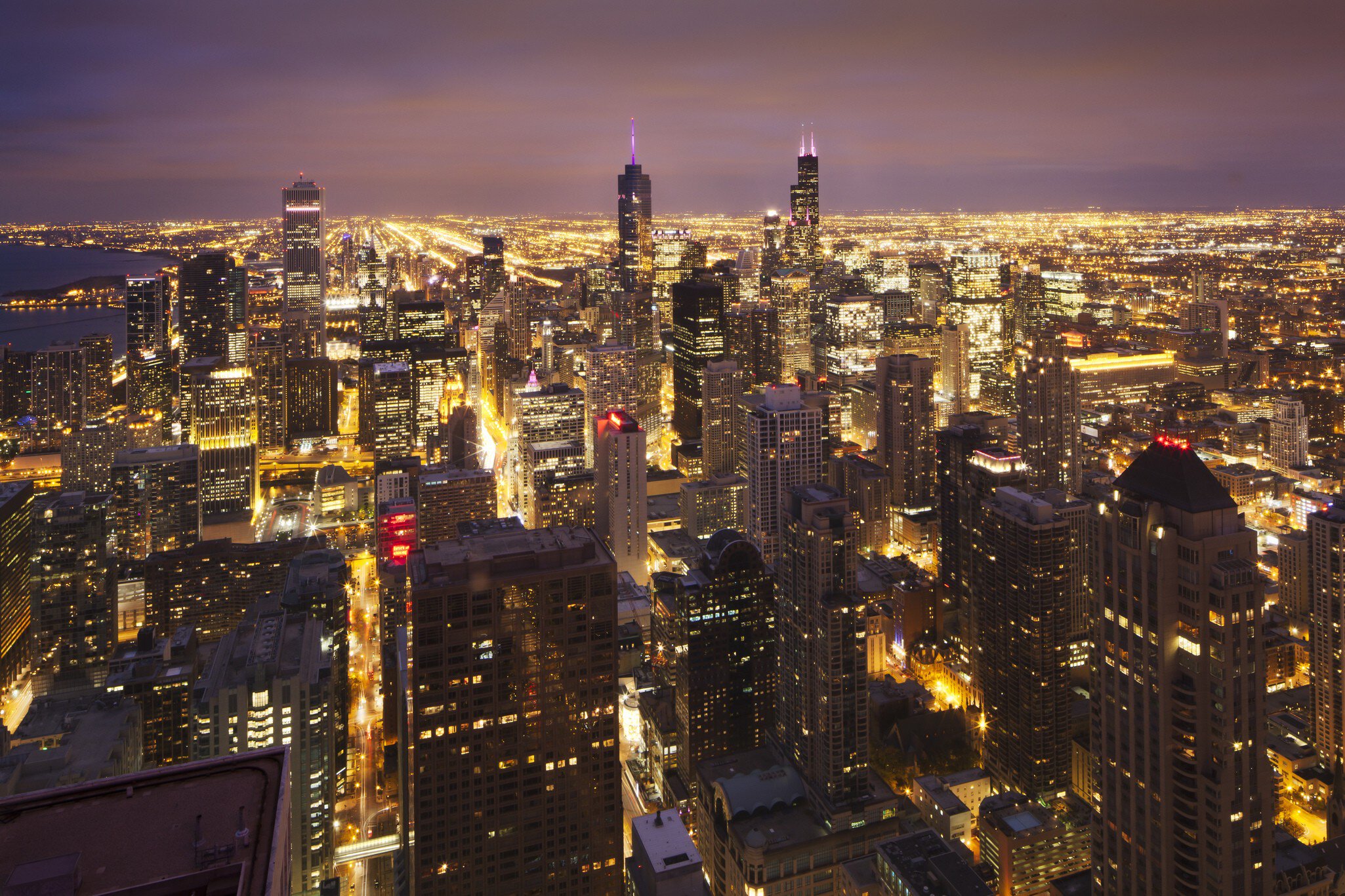 Overview of bright lights of Chicago at night.