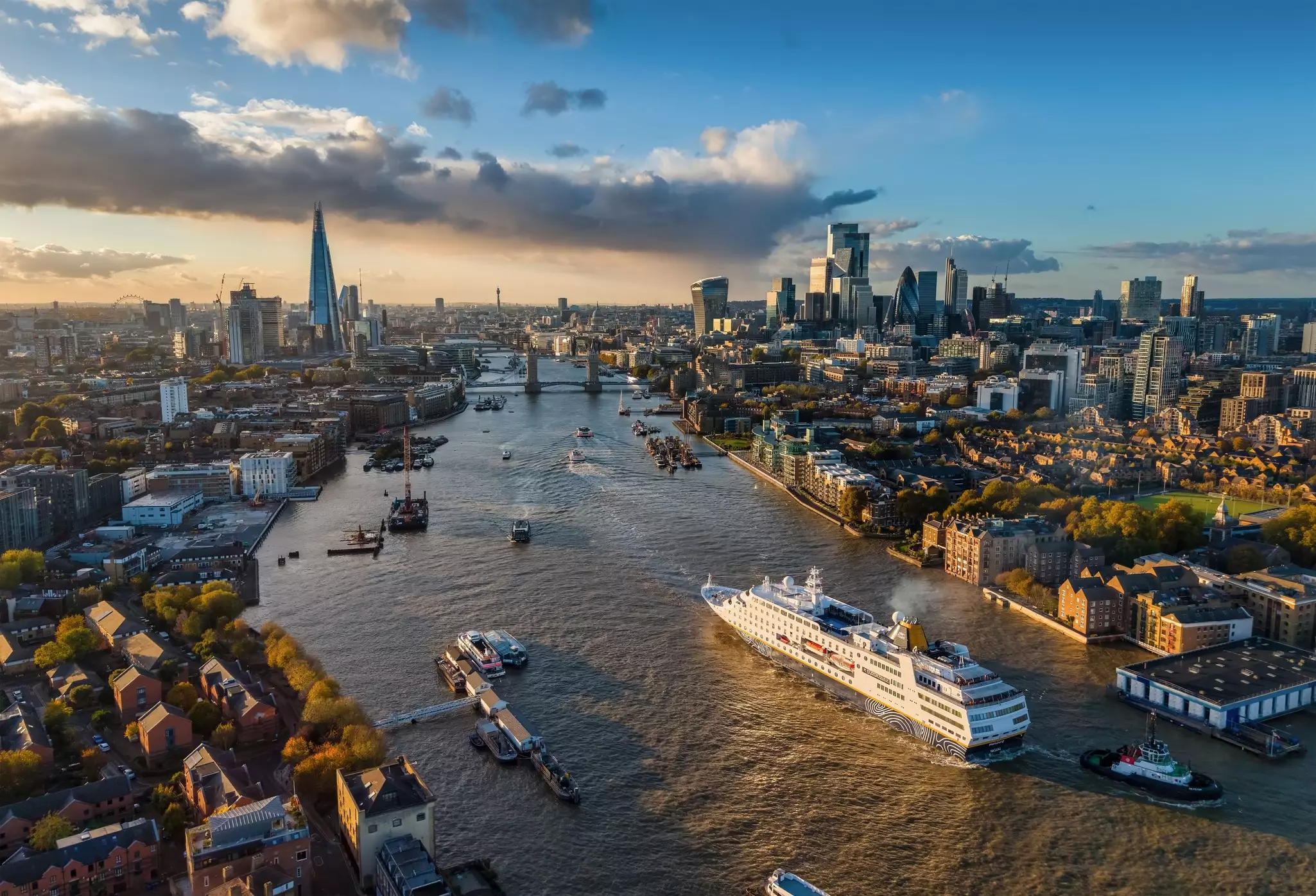 London, England - October 25th 2025: aerial view of the cruise ship MS Hamburg traveling over the Thames river towards Tower Bridge, License Type: media, Download Time: 2025-11-06T16:04:29.000Z, User: katelyn.perry_lonelyplanet, Editorial: true, purchase_order: 65050 - Digital Destinations and Articles, job: wip, client: wip, other: Katelyn Perry