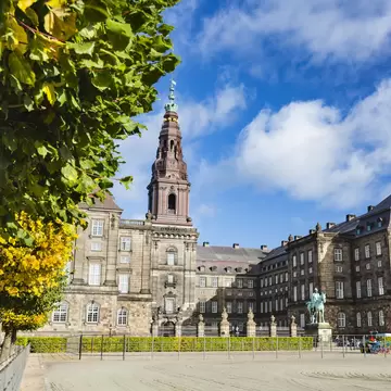 Trees and courtyard in front of Christiansborg Palace in Copenhagen, Denmark.