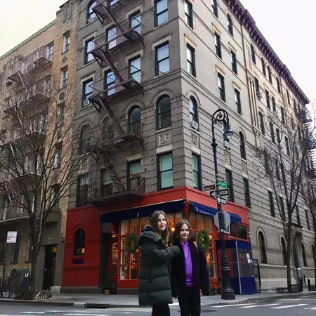 Tourists outside the "Friends" apartment in NYC West Village