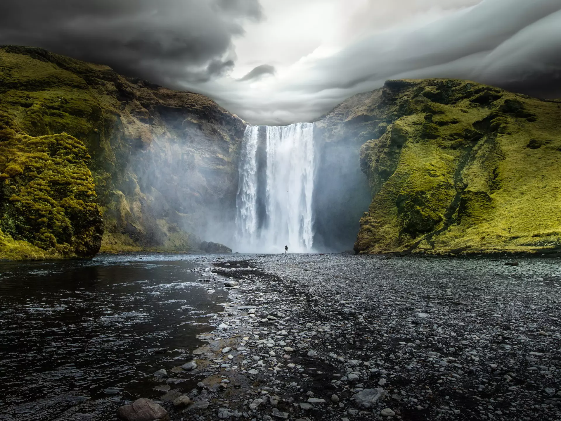Overcast sky over waterfall