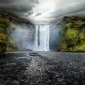 Overcast sky over waterfall