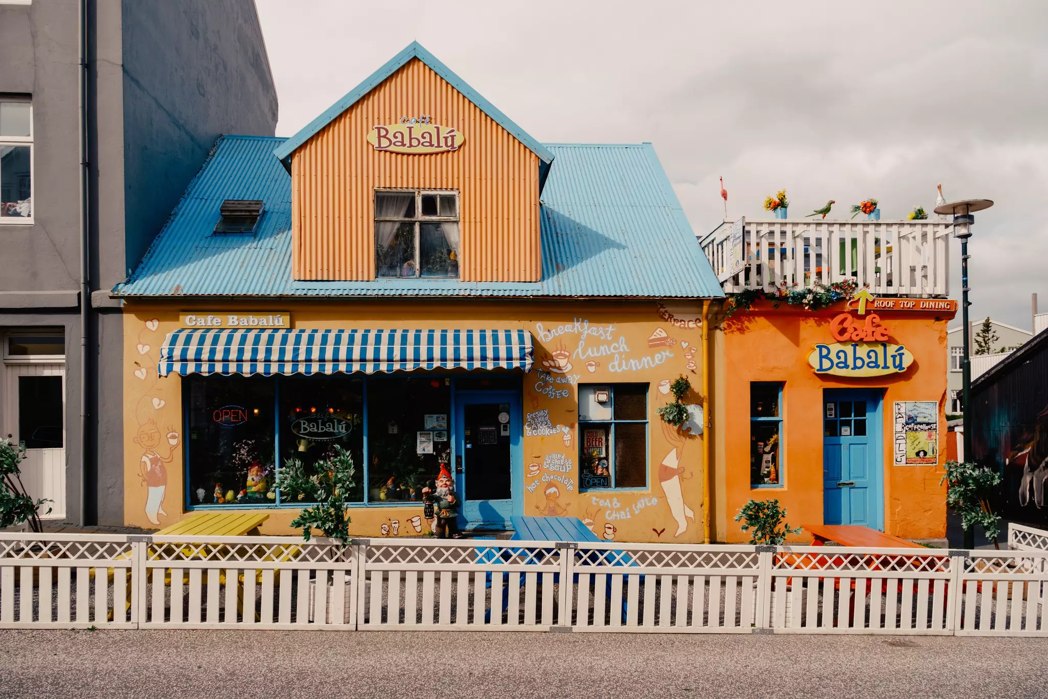 A quirky local cafe with a colorful frontage in Reykjavík, Iceland.