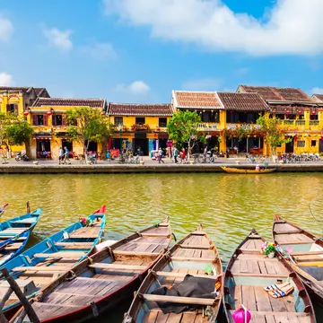 Fishing boats at the riverfront of Hoi An ancient town in Quang Nam Province of Vietnam