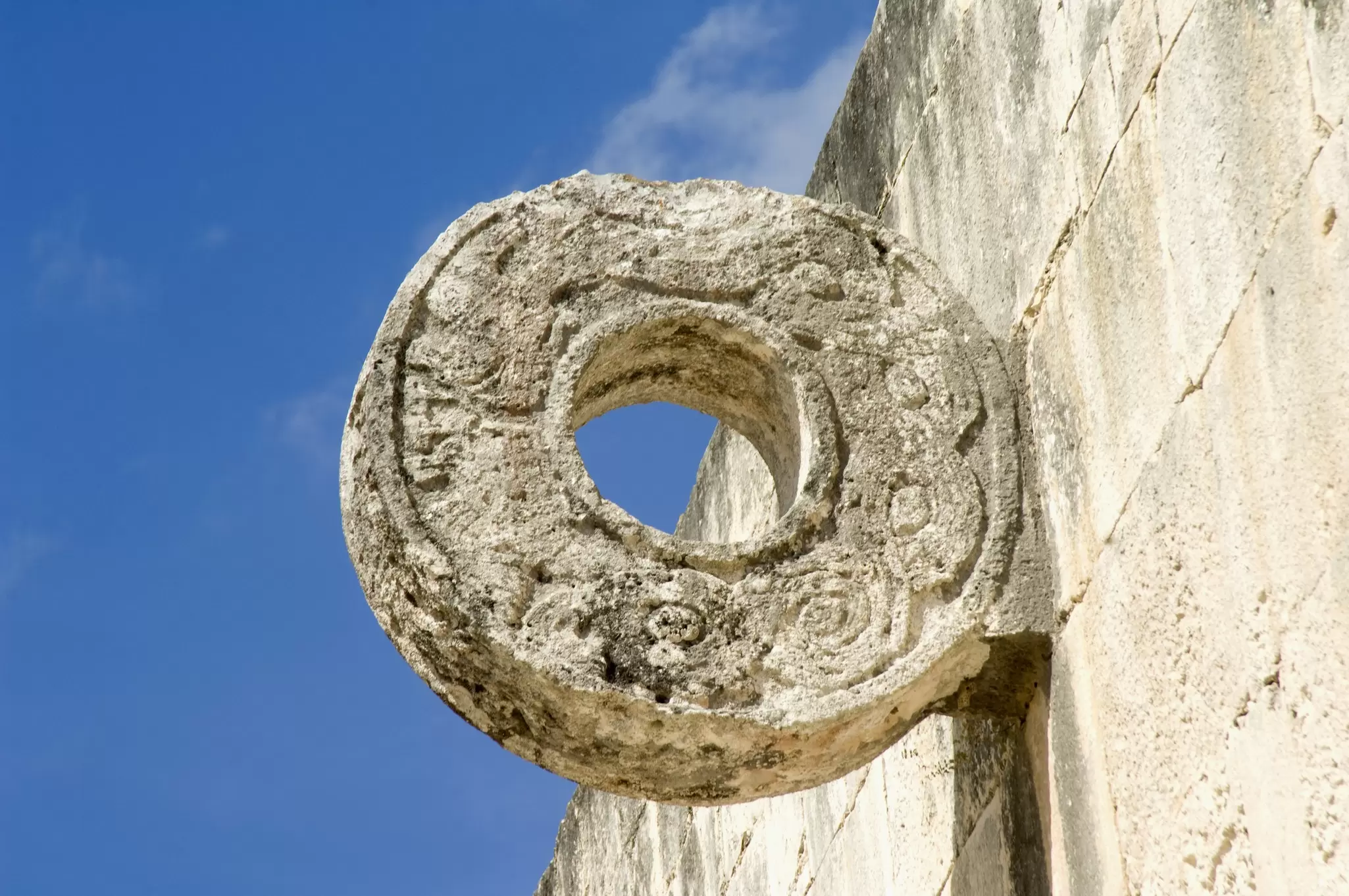 View of a carved ring with serpents at the Gran Juego de Pelota (ball court) at Chichén Itzá, Mexico.