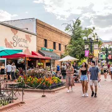 A stroll down Pearl Street is a quintessential experience when you visit Boulder, Colorado. Page Light Studios/Shutterstock