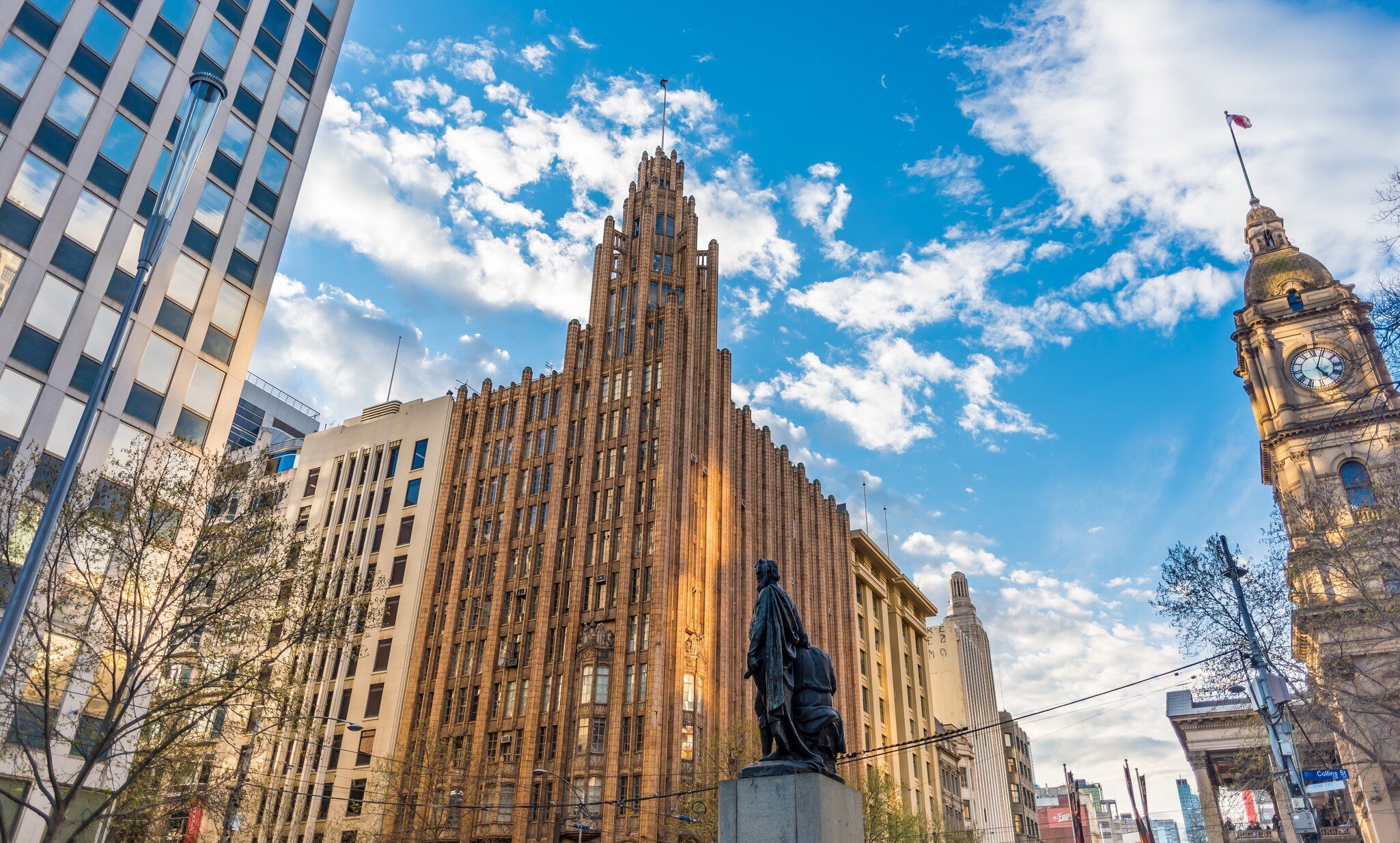 The Manchester Unity Building on the left and Melbourne City Town Hall tower on the right. Melbourne, Australia.