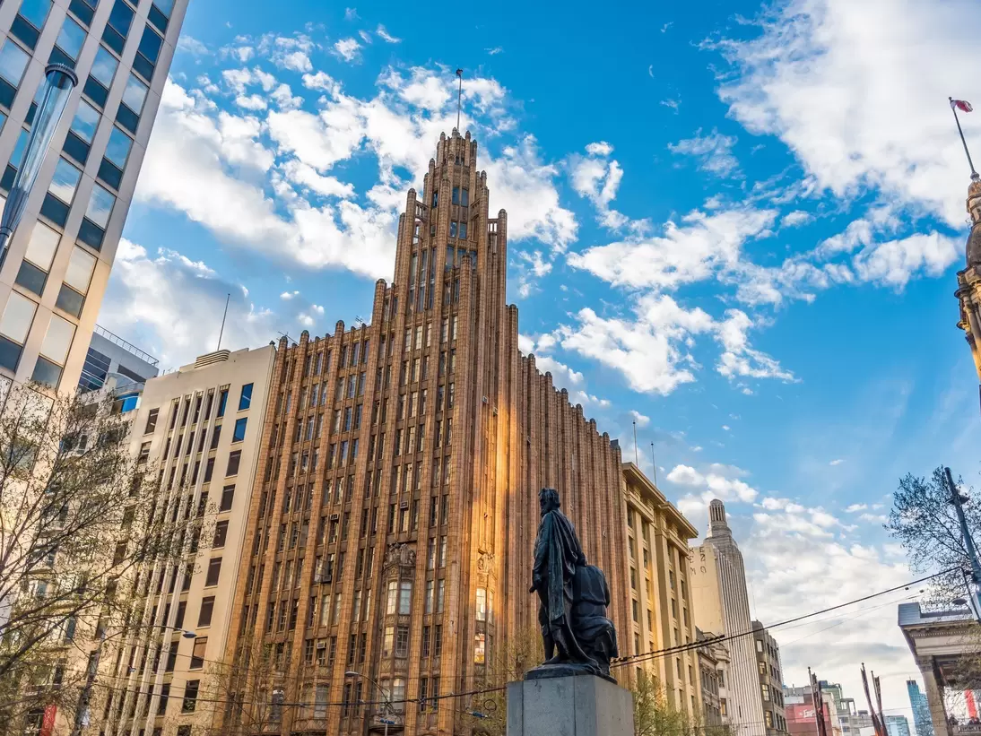 The Manchester Unity Building on the left and Melbourne City Town Hall tower on the right. Melbourne, Australia.