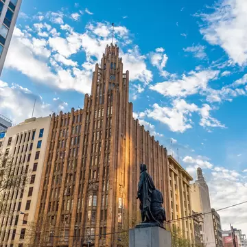 The Manchester Unity Building on the left and Melbourne City Town Hall tower on the right. Melbourne, Australia.