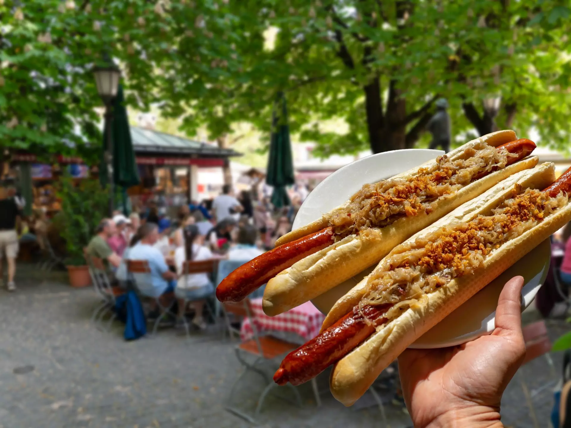 german bavarian hot dog in viktualienmarkt munich with sauerkraut street food ., License Type: media, Download Time: 2025-11-14T02:08:08.000Z, User: katherineeloisemarsh73, Editorial: false, purchase_order: 56530 - Guidebooks, job: Global Publishing-WIP, client: Munich Bavaria & the Black Forest 9, other: Kat/Marsh
