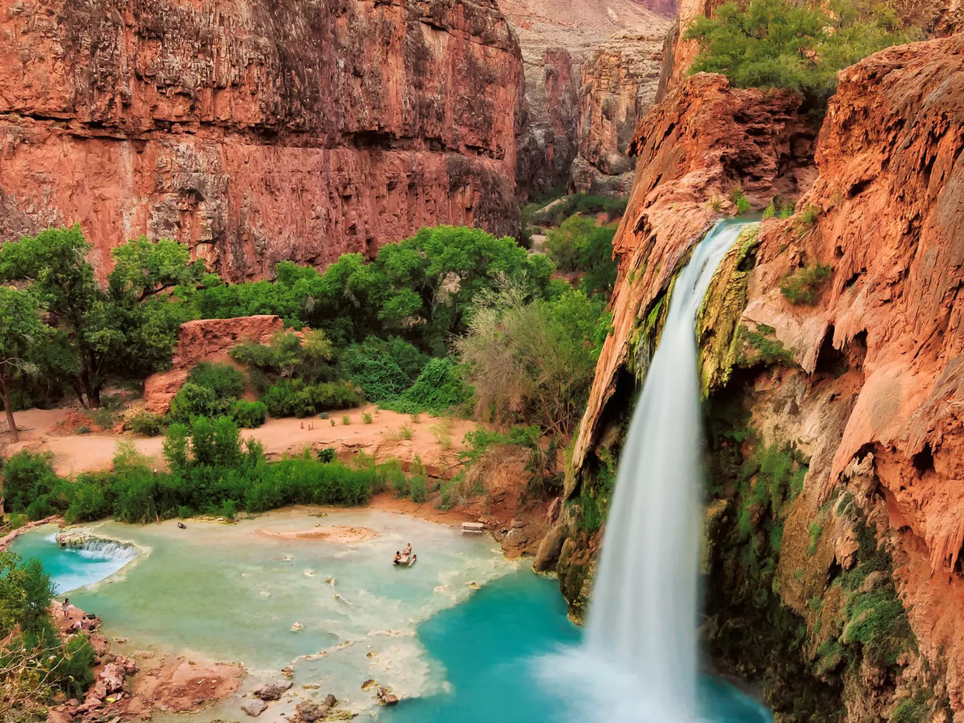 The best waterfalls in the United States in the Grand Canyon and flow with bright turquoise colored water. Havasu Falls, Supai, Arizona
480229912
Beautiful, Sparse, Wildlife Reserve, Beauty In Nature, Heaven, Native American Reservation, Havasu Falls, Havasupai Indian Reservation, Preserves, Falling, Beauty, Scenics, Backgrounds, North American Tribal Culture, Cascade Range, Indian Culture, Vitality, Majestic, Awe, Freshness, Idyllic, Relaxation, Cool, Purity, Exoticism, Multi Colored, Green Color, Blue, Clean, Wet, National Landmark, Tropical Climate, Nature, Swimming, Colorado, Arizona, USA, Leaf, Lush Foliage, Uncultivated, Bush, Animals In The Wild, Springtime, Liquid, Rock - Object, Canyon, Landscape, Spring - Flowing Water, Rapid, Waterfall, Stream, River, Flowing Water, Water, Park - Man Made Space, foliagé, supai
Beautiful Havasu Falls, Supai, Arizona, United States