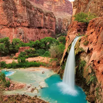The best waterfalls in the United States in the Grand Canyon and flow with bright turquoise colored water. Havasu Falls, Supai, Arizona
480229912
Beautiful, Sparse, Wildlife Reserve, Beauty In Nature, Heaven, Native American Reservation, Havasu Falls, Havasupai Indian Reservation, Preserves, Falling, Beauty, Scenics, Backgrounds, North American Tribal Culture, Cascade Range, Indian Culture, Vitality, Majestic, Awe, Freshness, Idyllic, Relaxation, Cool, Purity, Exoticism, Multi Colored, Green Color, Blue, Clean, Wet, National Landmark, Tropical Climate, Nature, Swimming, Colorado, Arizona, USA, Leaf, Lush Foliage, Uncultivated, Bush, Animals In The Wild, Springtime, Liquid, Rock - Object, Canyon, Landscape, Spring - Flowing Water, Rapid, Waterfall, Stream, River, Flowing Water, Water, Park - Man Made Space, foliagé, supai
Beautiful Havasu Falls, Supai, Arizona, United States