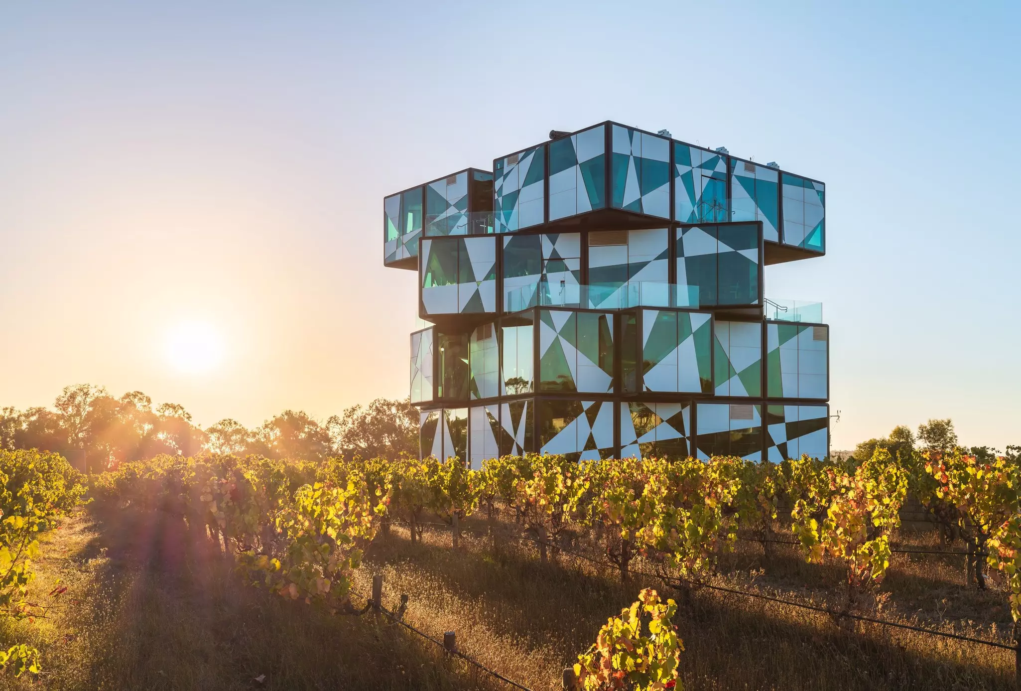 McLaren Vale, South Australia - April 4, 2021: The d'Arenberg Cube building in vineyards at sunset.