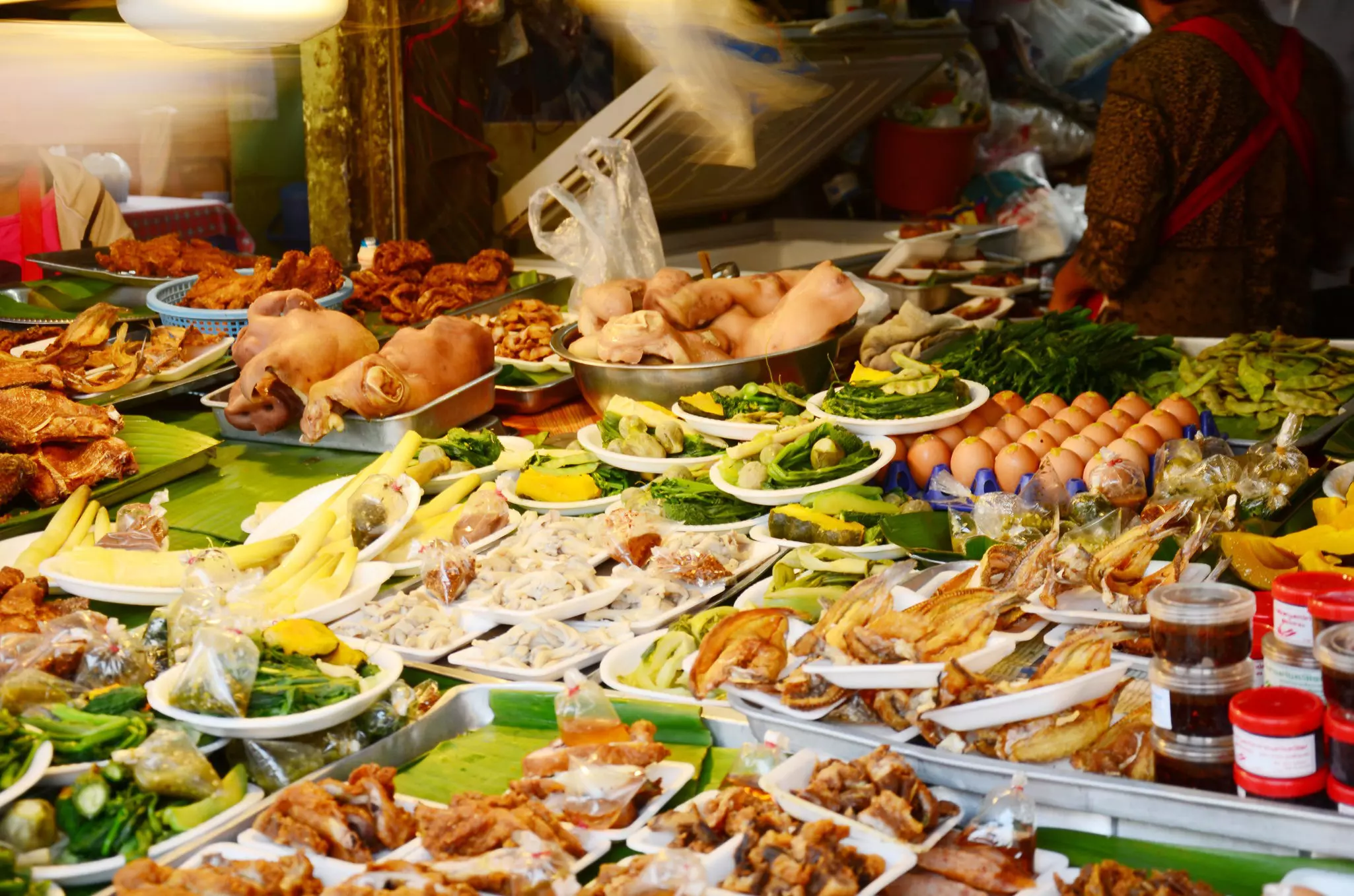 Street food for sale in a morning market in Chiang Rai, Thailand.
