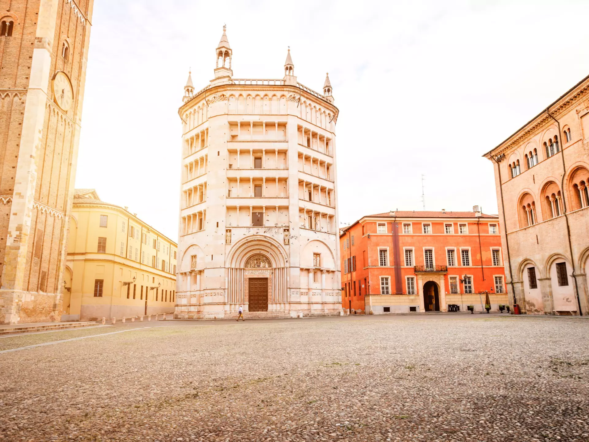 Parma cathedral with Baptistery leaning tower on the central square in Parma town in Italy. RossHelen / Getty Images