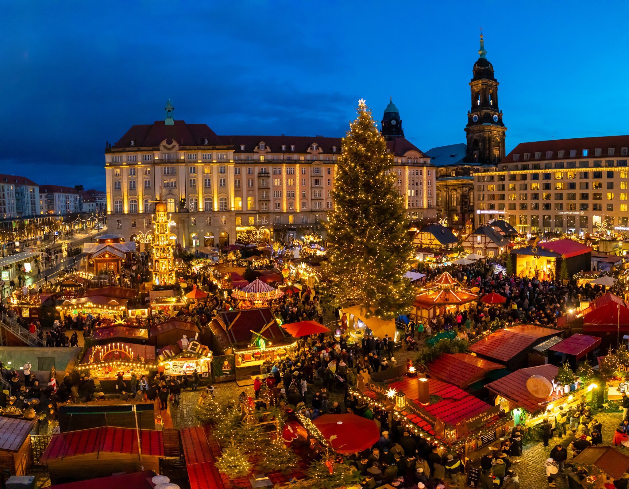 Dresden, Germany: People visit Christmas Market Striezelmarkt in Dresden, Germany. Christmas fair, European traditions