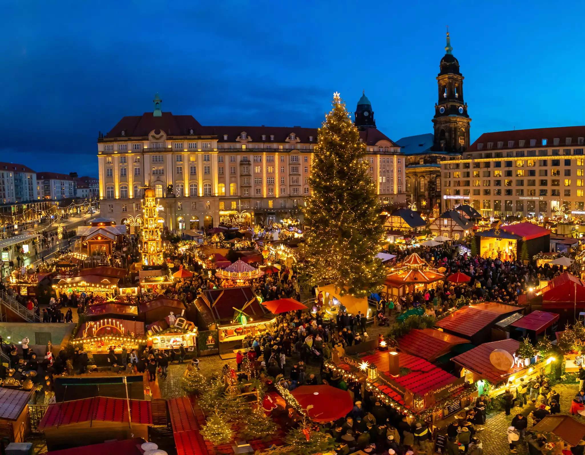Dresden, Germany: People visit Christmas Market Striezelmarkt in Dresden, Germany. Christmas fair, European traditions