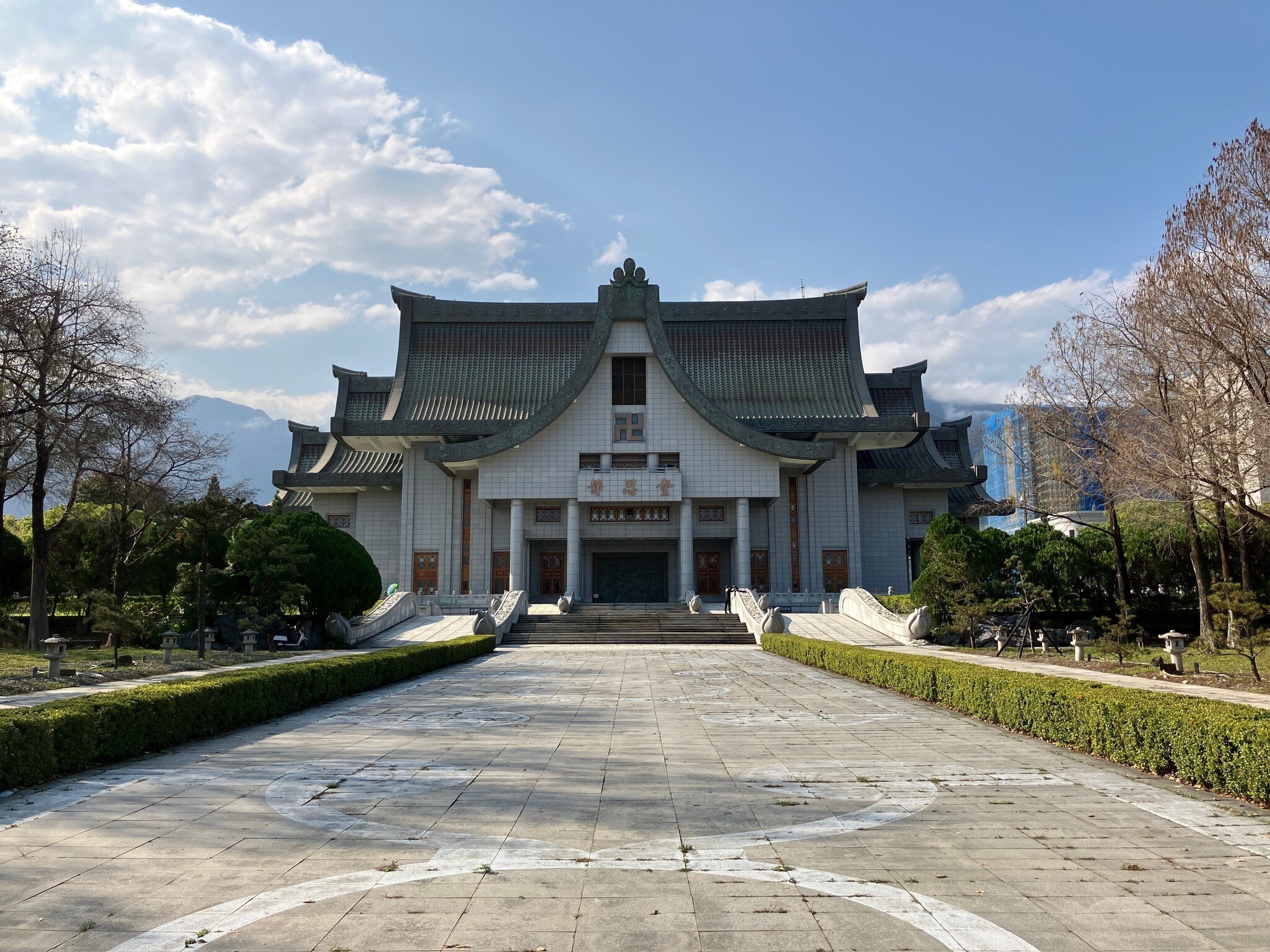 Large white and gray temple and performance venue, Jing Si Hall in Hualien, Taiwan.
