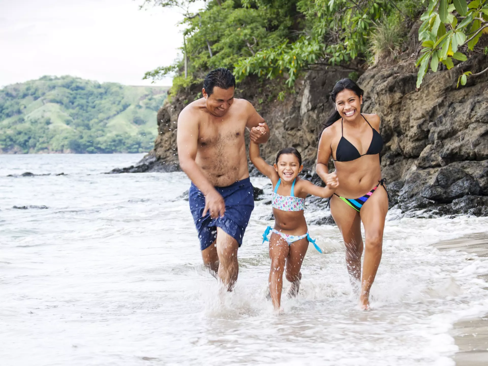 A family playing in the surf on a Costa Rican beach
171285729
"Latin America, Little Girls, Women, Men, Three People, Child, Laughing, Running, Southern European Descent, Latin American and Hispanic Ethnicity, Happiness, Tropical Climate, Vacations, Cheerful, Family, Costa Rica, Beach, Sea, Surf, Swimwear, Lifestyle, Travel Locations, Families, Spanish and Portuguese Ethnicity"
