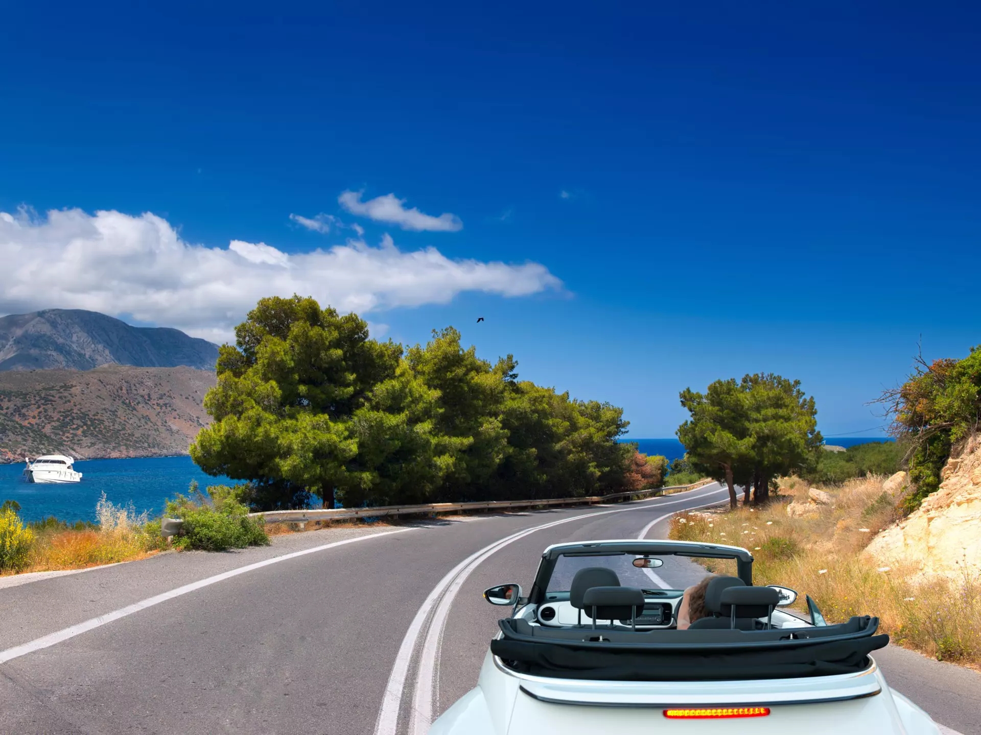 Wind through idyllic Greek landscapes on our favourite road trips. Krivosheev Vitaly/Shutterstock
