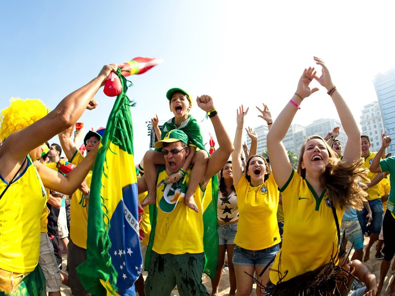 World Cup 2014, Rio de Janeiro, Brazil - June 28: Supporters celebrate at the Fifa Fan Fest area on Copacabana beach during a match high on emotion and drama between Brazil and Chile