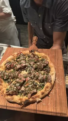 Pizza topped with wagyu beef