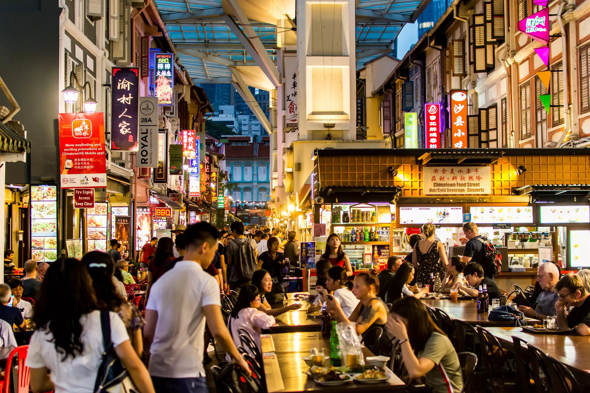 Food vendors at patrons along Smith St, Singapore. Kapi Ng/Shutterstock
