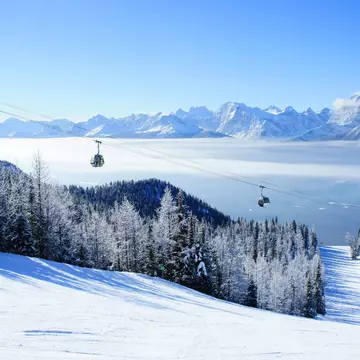 Picture of temperature inversion at Lake Louise, causing a cloud of sea with gondola visible., License Type: media, Download Time: 2025-12-04T23:48:55.000Z, User: catalinaaragon, Editorial: false, purchase_order: 56530 - Guidebooks, job: Global Publishing WIP, client: Canada 17, other: Canada 17