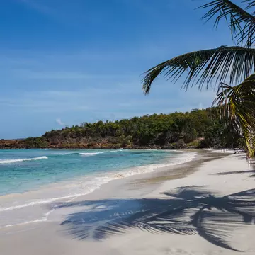 The Caribbean Sea and white sand backdrop of Playa Zoni beach on a sunny day in Culebra, Puerto Rico; Shutterstock ID 1782964190;