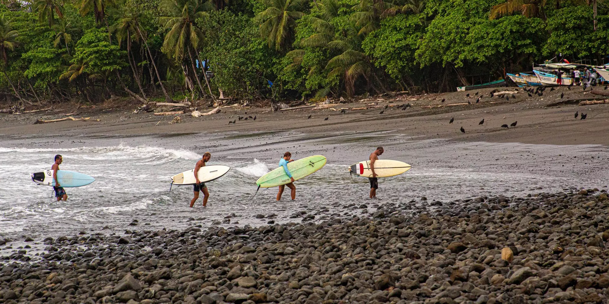 Surfers in Punta Arenas, Pavones, Costa Rica