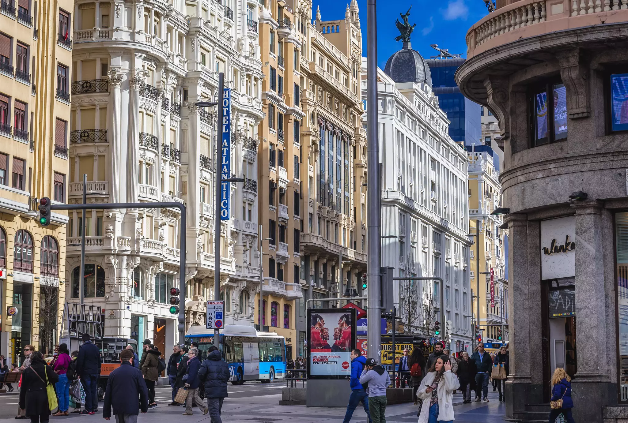 A built-up downtown area with busy shoppers