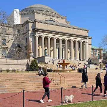 NEW YORK, USA - MARCH 18, 2022: Students on steps leading to Low Memorial Library on Morningside Heights campus of Columbia University. Sunny spring day  License Type: media  Download Time: 2023-12-13T12:36:29.000Z  User: FergalCo  Is Editorial: Yes  purchase_order:   