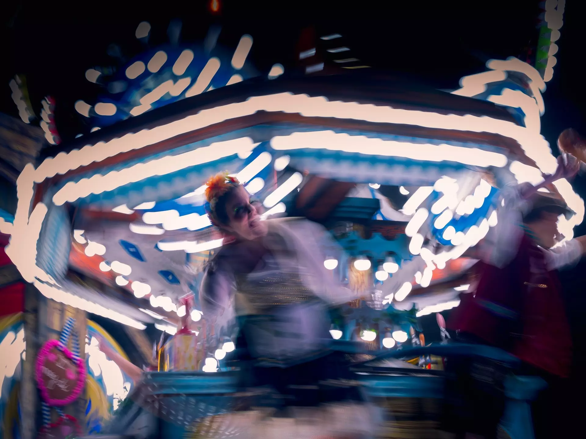 Glastonbury, UK - November 16th, 2024: Glastonbury Carnival Float Blurry Fairground Whirl, License Type: media, Download Time: 2025-05-20T19:56:03.000Z, User: lonelyplanetmedia, Editorial: true, purchase_order: 65050 - Digital Destinations and Articles, job: Global Publishing WIP, client: Global Publishing WIP, other: Pia Peterson Haggarty