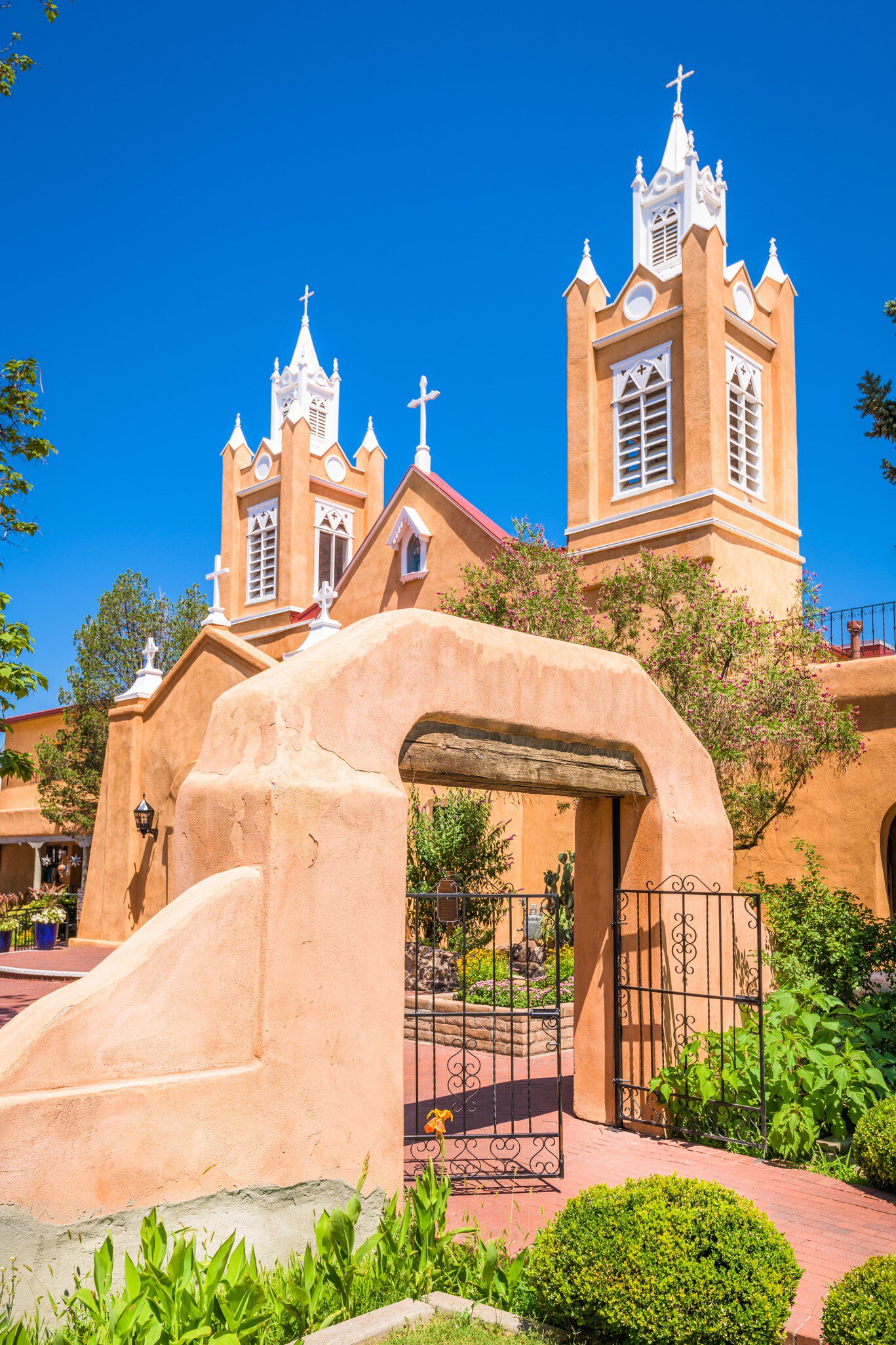 front entrance to the beautiful adobe San Felipe de Neri Church in Albuquerque, New Mexico