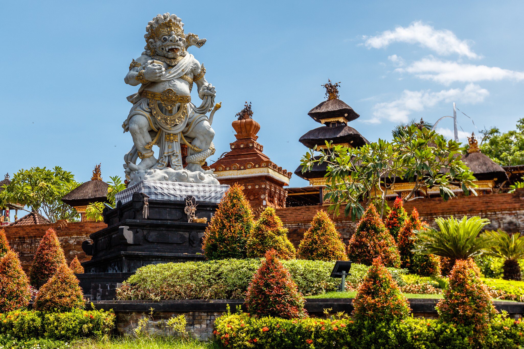 Statue of Buto Ijo, the guardian of Petitenget area near temple Pura Petitenget. Bali, Indonesia.  License Type: media  Download Time: 2024-03-14T08:43:38.000Z  User: mvm_lonelyplanet  Is Editorial: No  purchase_order:   