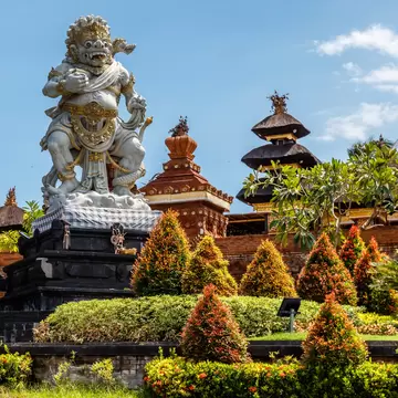 Statue of Buto Ijo, the guardian of Petitenget area near temple Pura Petitenget. Bali, Indonesia.  License Type: media  Download Time: 2024-03-14T08:43:38.000Z  User: mvm_lonelyplanet  Is Editorial: No  purchase_order:   