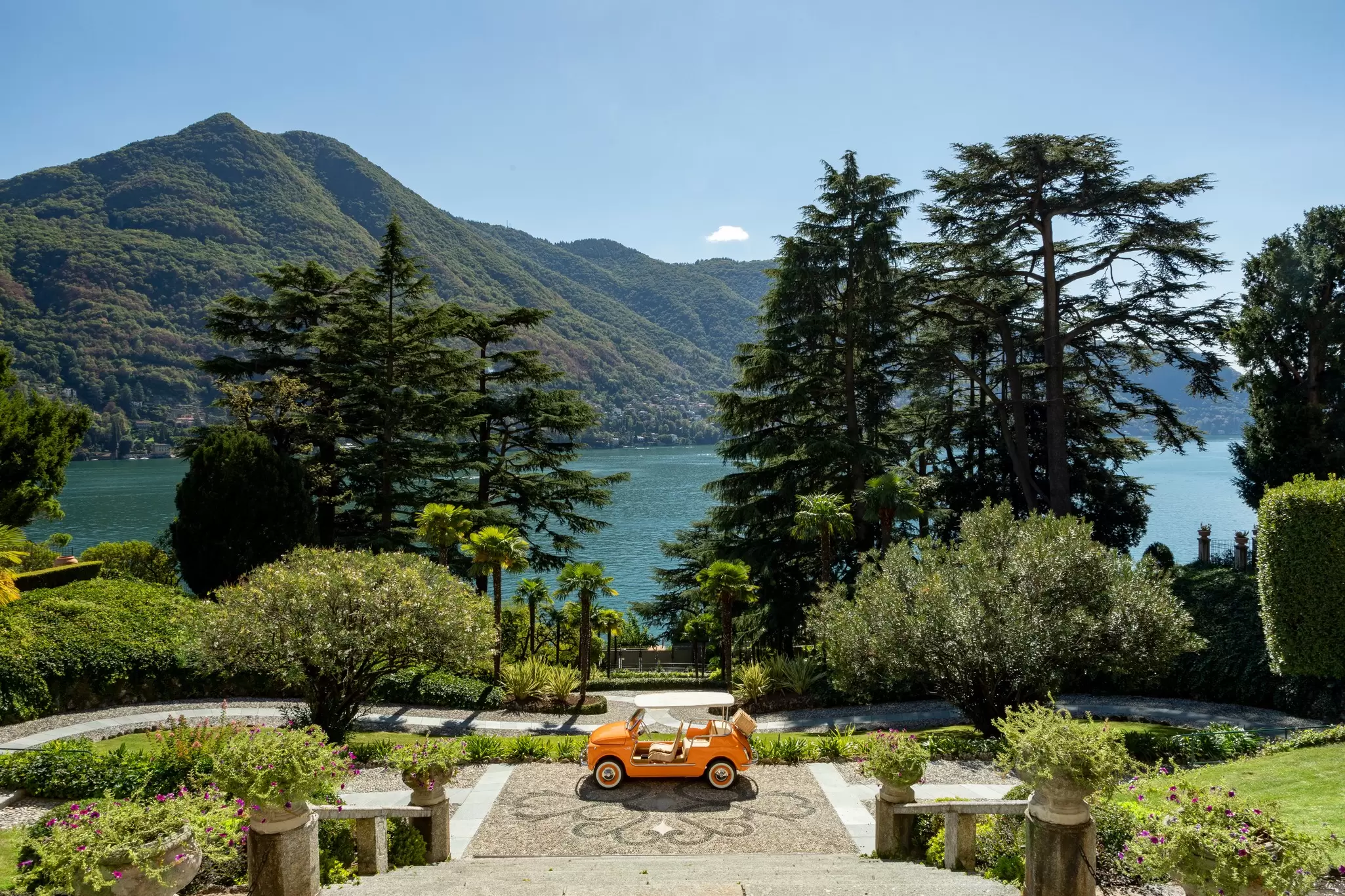 A vast ornate garden gives way to a beautiful lakeshore: Passalacqua hotel in Lake Como, Italy