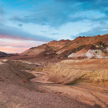 Hikers in the desert at Death Valley National Park. Mohsin Hasan/500px/Getty Images