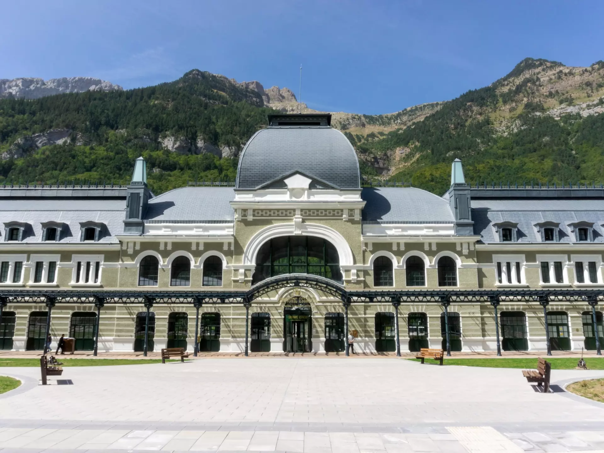 Cancfranc, Aragon, Spain; September 5, 2023: Entrance to the beautiful Canfranc international railway station (1925). Today, it is a luxury hotel managed by an important company in the sector.  License Type: media  Download Time: 2024-03-08T10:10:06.000Z  User: clairenaylor  Is Editorial: Yes  purchase_order:   
