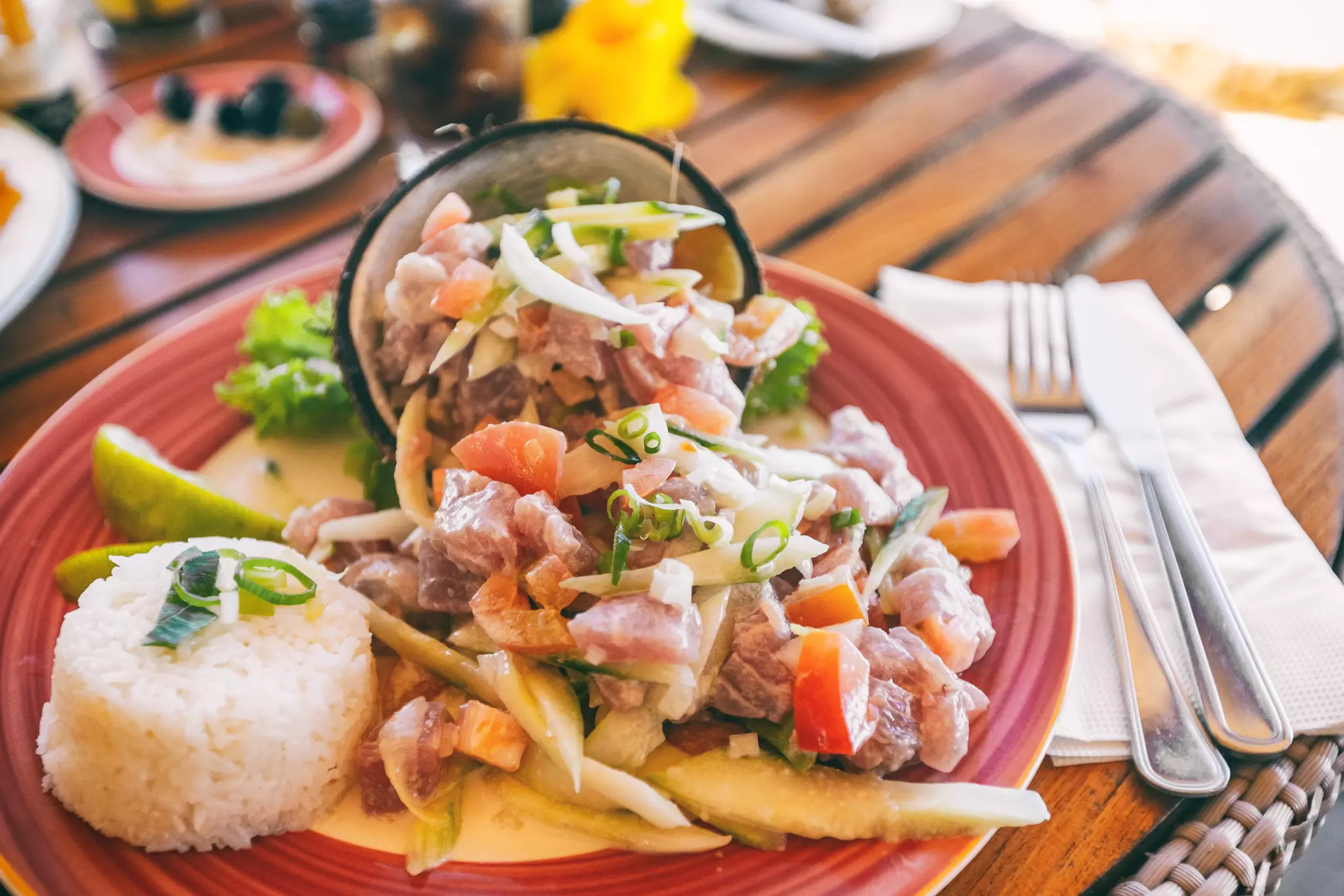 A plate of poisson cru (raw fish salad) in Bora Bora. 