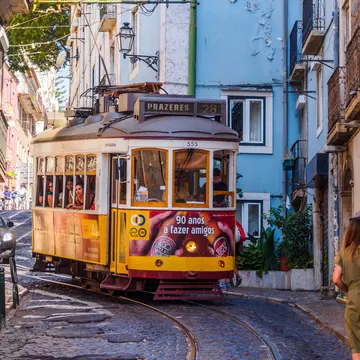 August 22, 2017: Street car in the narrow streets of Lisbon.
755689207
urban, tourist attraction, city center, pedestrian street, street tramway, front view, classic, colorful, horizontal, lisboa, old, old fashioned, people, portugal, portuguese, rail, rail transport vehicle, summer, tourism, transport, travel, yellow, alfama, busy, cable car, campo ourique, capital, center, city, cobblestone street, day, electric, famous, journey, known, line, martin moniz, prazeres, sightseeing, street, streetcar, sunny, tourists, tram, trolley car, unique