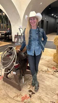 Calgary Caroline Trefler cowboy boots and hat July 2026