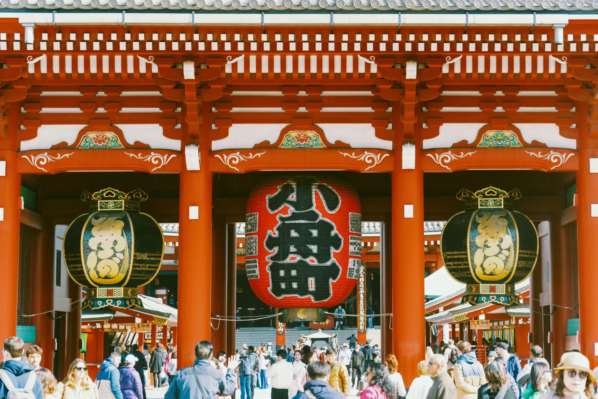 TOKYO, JAPAN. APRIL 2025. 
ASAKUSA
Hōzō-mon at Sensō-ji
Painted red temple gate with ornate red, black, and gold lanterns