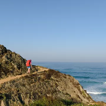 A hiker on the Fisherman’s Trail along Portugal’s southwestern coast. Y. Zhao/Shutterstock